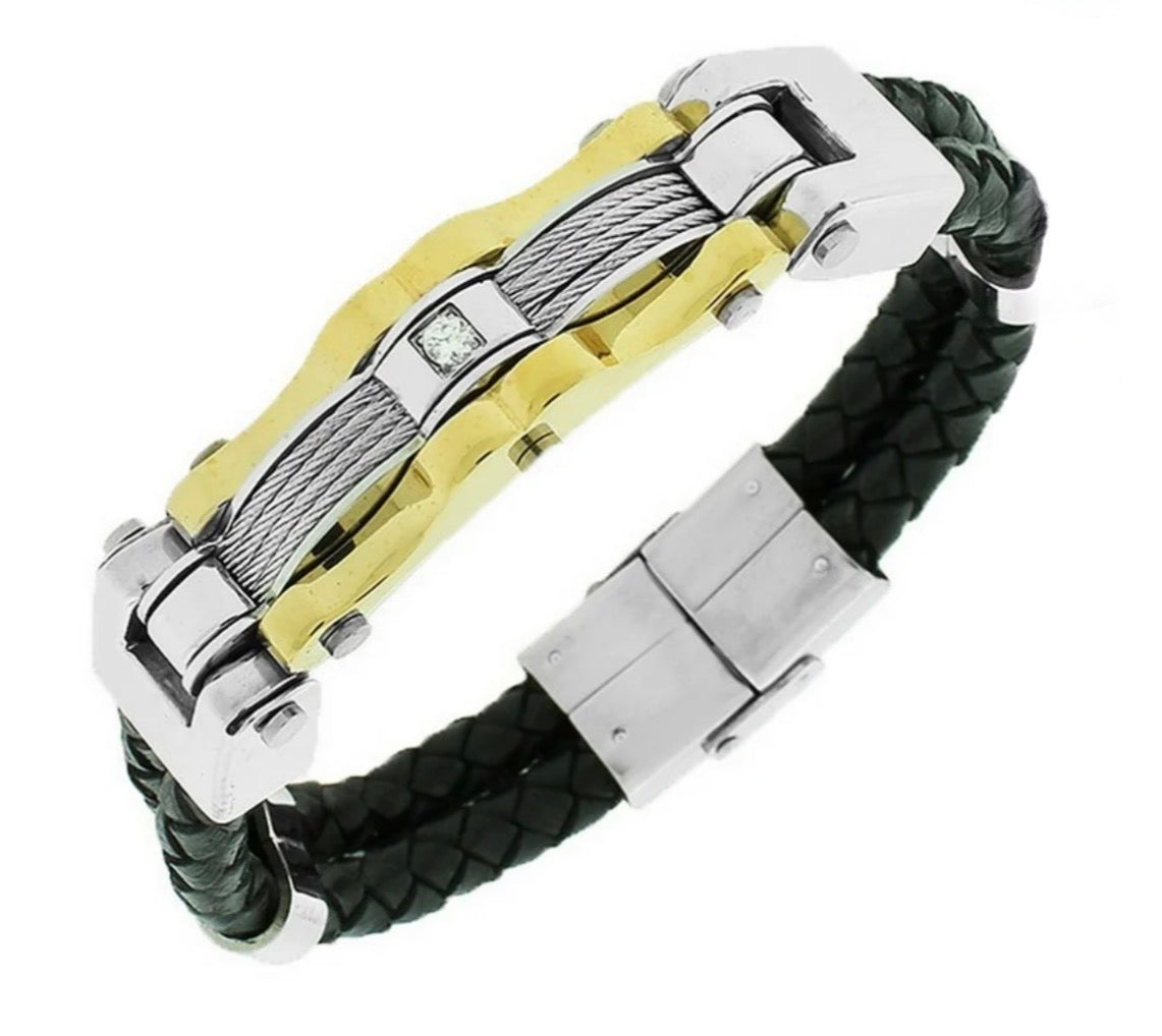 men's bracelet featuring a black braided leather band with a stainless steel and gold-tone titanium center link and a single white cubic zirconia accent.