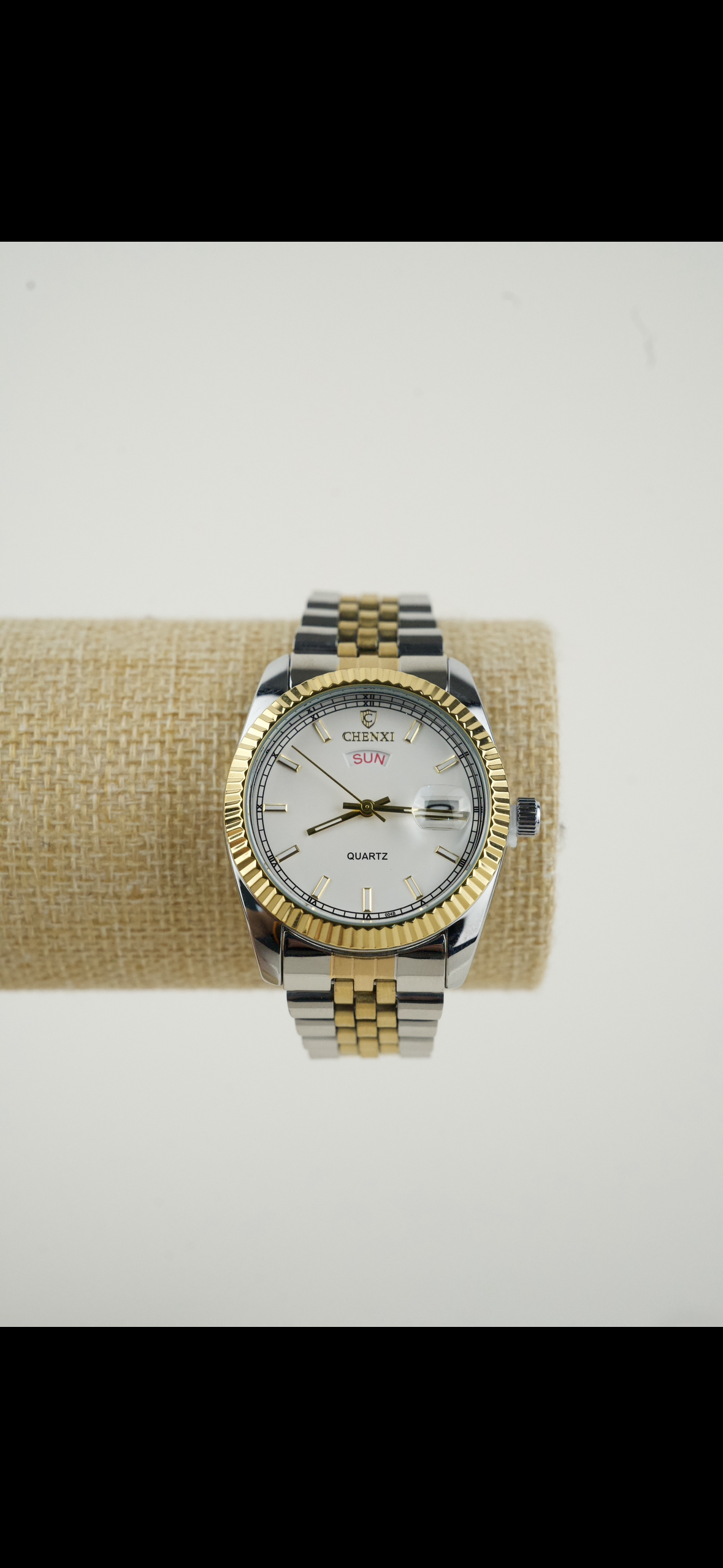 This is a CHENXI men's quartz watch with a two-tone (silver and gold) stainless steel band