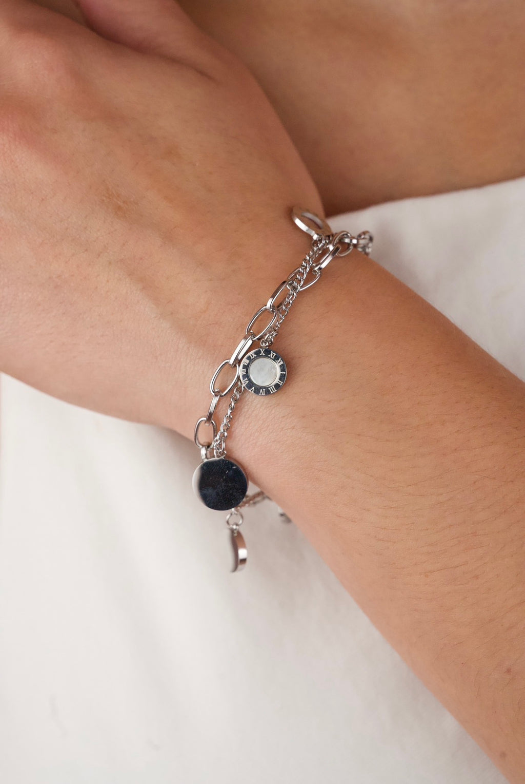 Jewels Galaxy stainless steel silver-plated Roman numerals link bracelet.