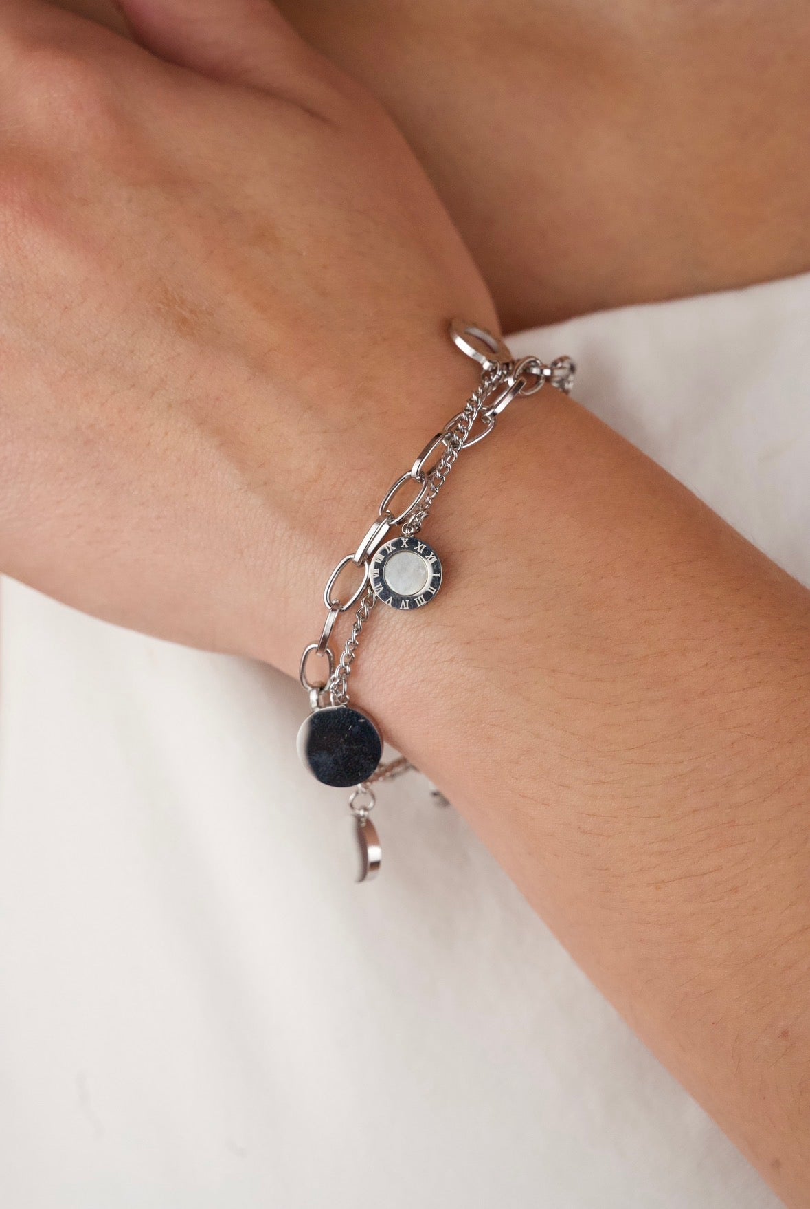 Jewels Galaxy stainless steel silver-plated Roman numerals link bracelet.